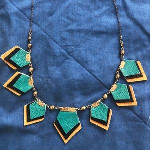 Necklace with teal leather pieces